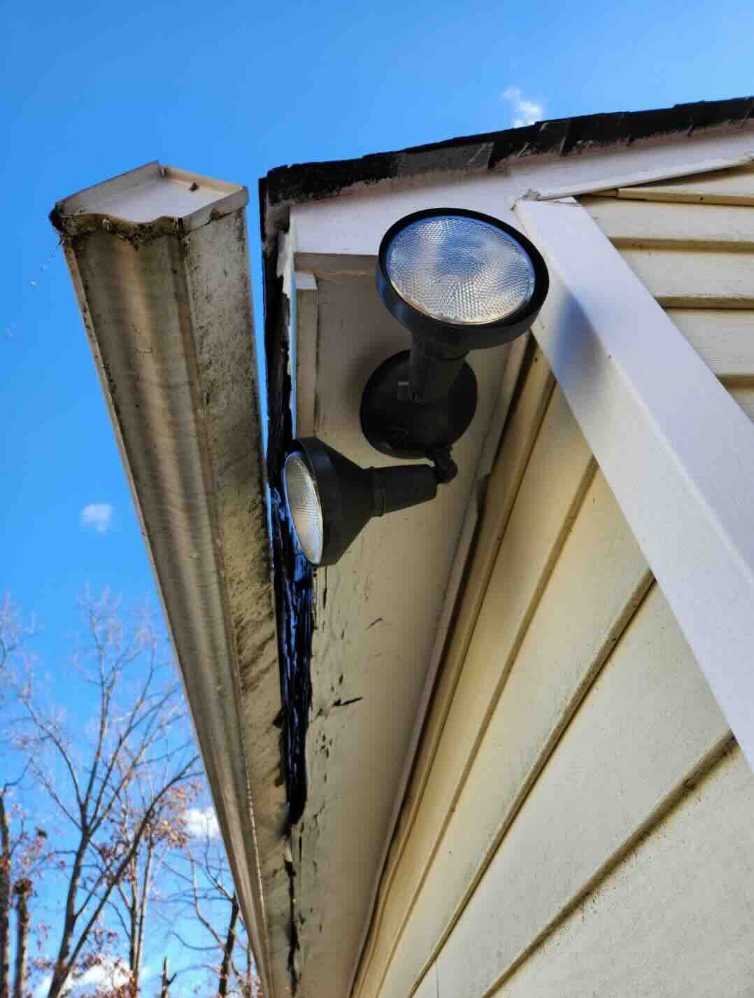 Detached gutter and rotting fasica board